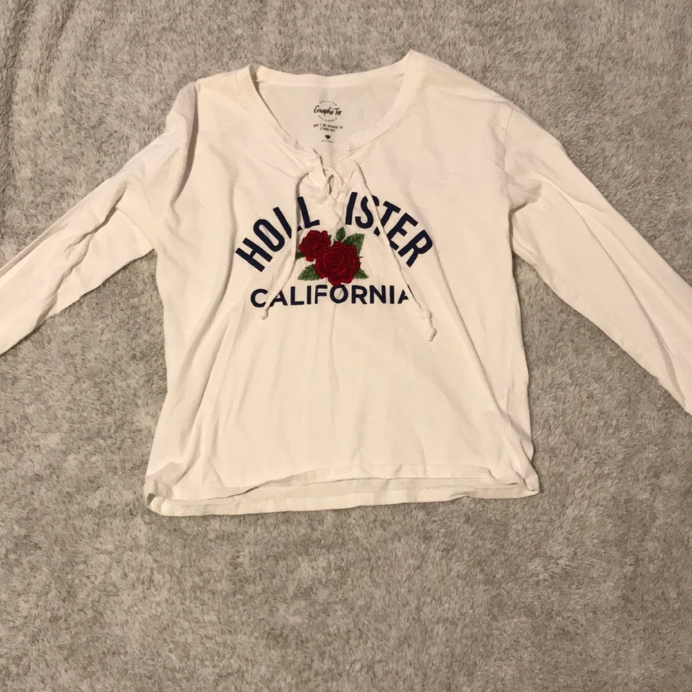 white hollister long sleeved shirt with roses
